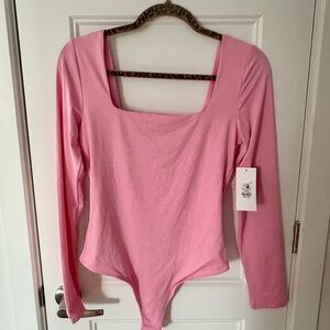 women's pink long sleeve bodysuit